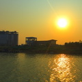 Sunset on the mekong river with sokha hotel under construction.JPG